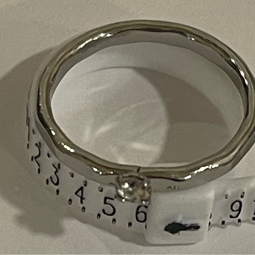 Silver toned hammered clear stone ring​​​​​​​​